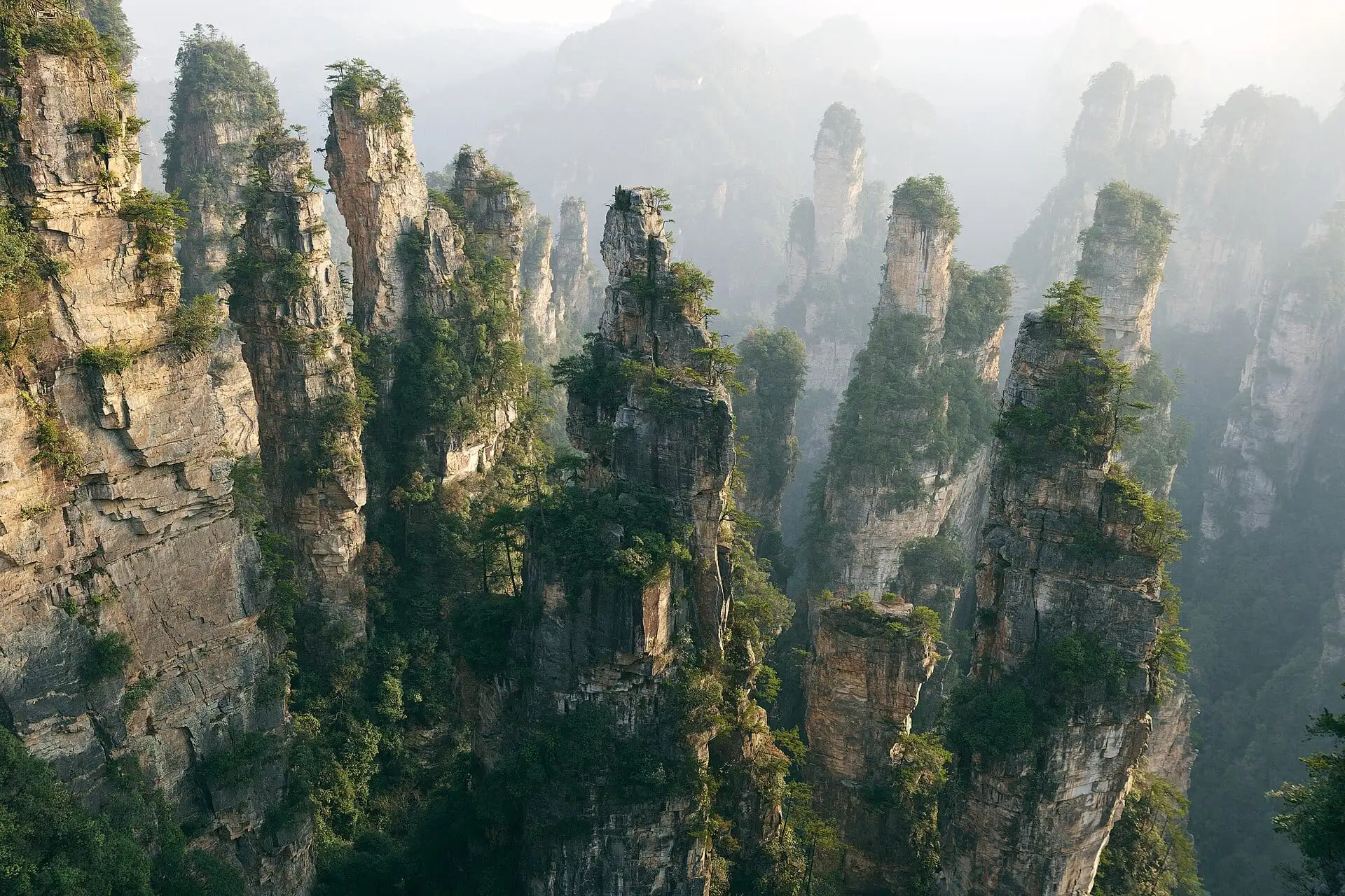 Misty sandstone pillars in Zhangjiajie National Forest Park